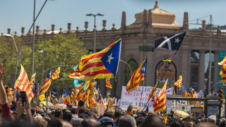 Catalan demonstrators with national catalan symbols in Barcelona to support the freedom of the political prisoners.More than 300.000 people have participated in the demonstration. 04. 16. 2018 Spain, Barcelonaのeditorial素材