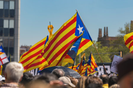 Catalan demonstrators with national catalan symbols in Barcelona to support the freedom of the political prisoners.More than 300.000 people have participated in the demonstration. 04. 16. 2018 Spain, Barcelonaのeditorial素材