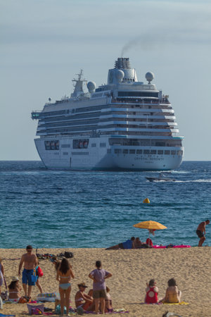 Big tourist ship near the mediterranean town Palamos in Spain, 30. 07. 2012 Spainのeditorial素材