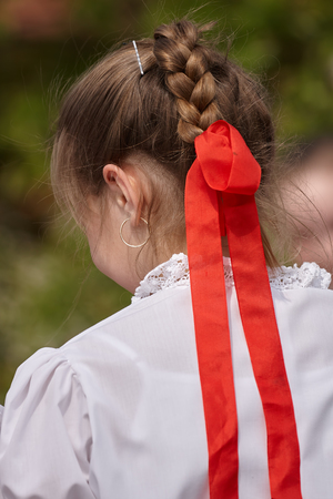 Young dancer girl in a festival in traditional Hungarian costumeの写真素材