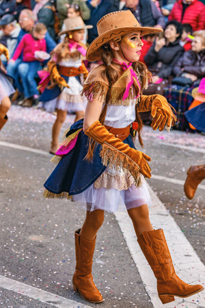 Traditional carnival in a Spanish town Palamos in Catalonia. Many people in costume and interesting make-up. 03. 01. 2019 Spainのeditorial素材