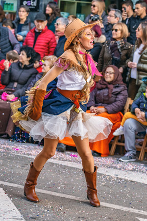 Traditional carnival in a Spanish town Palamos in Catalonia. Many people in costume and interesting make-up. 03. 01. 2019 Spainのeditorial素材
