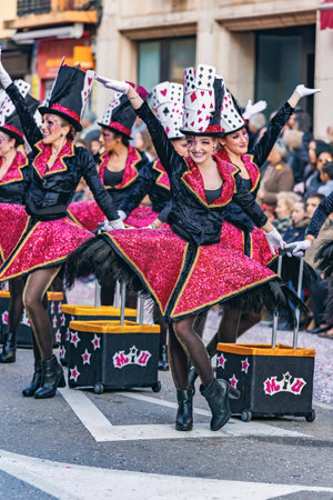 Traditional carnival in a Spanish town Palamos in Catalonia. Many people in costume and interesting make-up. 03. 01. 2019 Spainのeditorial素材