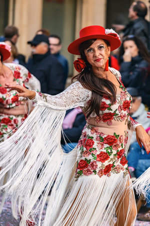 Traditional carnival in a Spanish town Palamos in Catalonia. Many people in costume and interesting make-up. 03. 01. 2019 Spainのeditorial素材