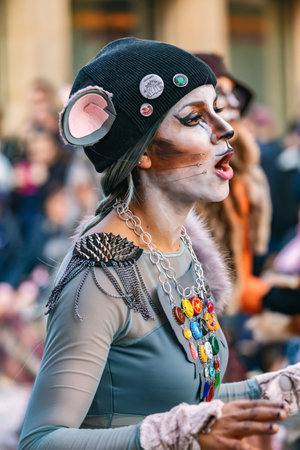 Traditional carnival in a Spanish town Palamos in Catalonia. Many people in costume and interesting make-up. 03. 01. 2019 Spainのeditorial素材