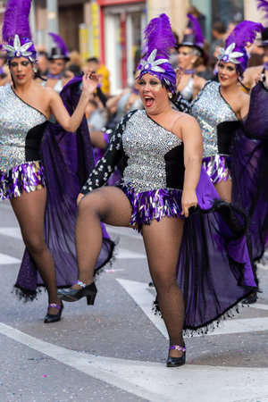 Traditional carnival in a Spanish town Palamos in Catalonia. Many people in costume and interesting make-up. 03. 01. 2019 Spainのeditorial素材