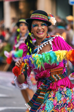Traditional carnival in a Spanish town Palamos in Catalonia. Many people in costume and interesting make-up. 03. 01. 2019 Spainのeditorial素材