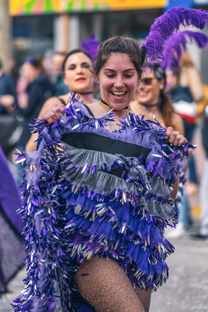 Traditional carnival in a Spanish town Palamos in Catalonia. Many people in costume and interesting make-up. 03. 03. 2019 Spainのeditorial素材