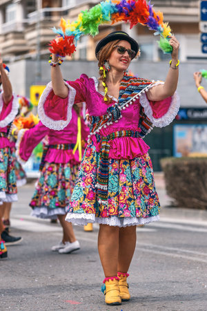 Traditional carnival in a Spanish town Palamos in Catalonia. Many people in costume and interesting make-up. 03. 03. 2019 Spainのeditorial素材