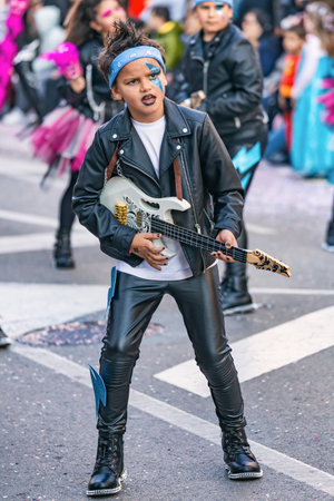 Traditional carnival in a Spanish town Palamos in Catalonia. Many people in costume and interesting make-up. 03. 01. 2019 Spainのeditorial素材
