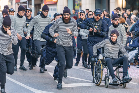 Traditional carnival in a Spanish town Palamos in Catalonia. Many people in costume and interesting make-up. 03. 01. 2019 Spainのeditorial素材