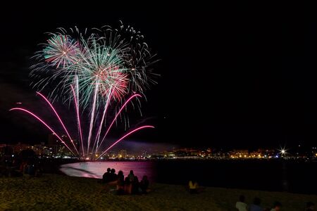 Beautiful firework in a small Spanish town Palamos, day of celebrating the town 06. 26. 2019の写真素材