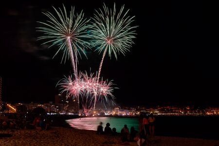 Beautiful firework in a small Spanish town Palamos, day of celebrating the town 06. 26. 2019の写真素材