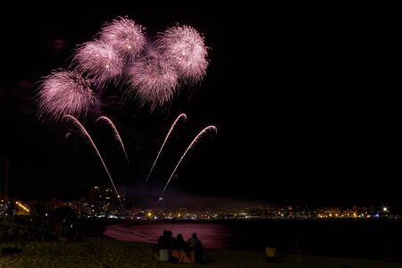 Beautiful firework in a small Spanish town Palamos, day of celebrating the town 06. 26. 2019の写真素材