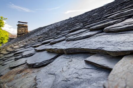 A traditional roof structure made of volcanic stone on a Spanish village houseの写真素材