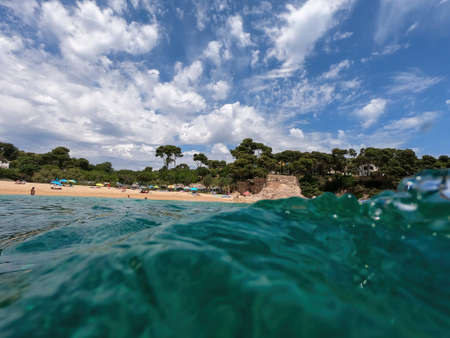 Seascape Mediterranean sea, split view over and under water surface, Spain, Costa Brava, Catalonia, Palamos.の写真素材