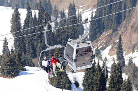 ALMATY, KAZAKHSTAN - APRIL 6, 2011: Cableway to the Shymbulak ski station