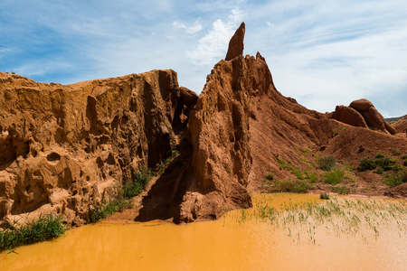 Colorful rock formations in Fairy tale canyon located on southern shore of Issyk-Kul lake, Kyrgyzstanのeditorial素材