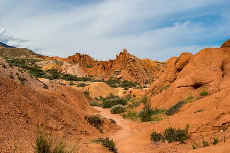 Colorful rock formations in Fairy tale canyon located on southern shore of Issyk-Kul lake, Kyrgyzstanのeditorial素材