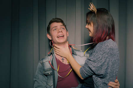 Happy couple in a photo booth