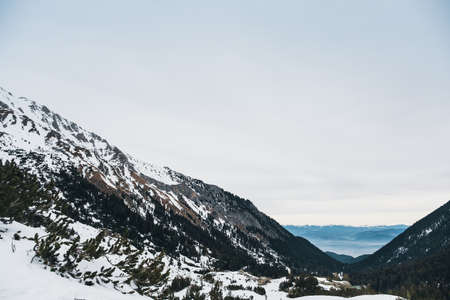 Winter view of mountains, beautiful wonderland mountain sceneryの写真素材