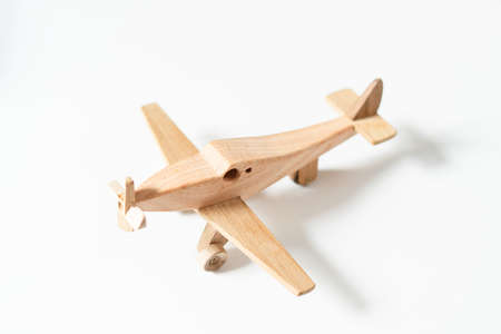 Hand drawing wooden children plane toy. Ecological toys. Use for poster, card, invitation, banner, advertising, marketing, shop, print, textile, designの写真素材