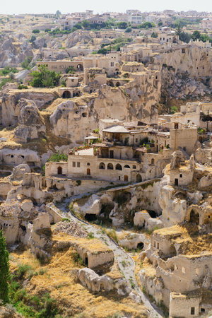 Day view of Goreme town with blue clear sky on horison. Famous center of balloon fligths