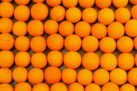 Top view on a Bunch of fresh tangerines orangesの写真素材