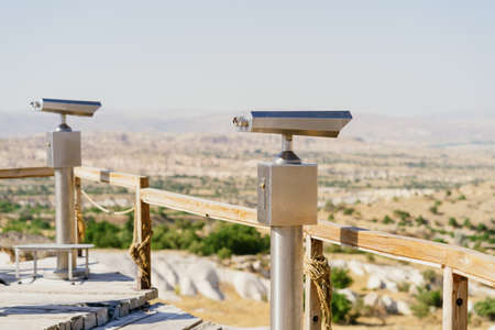 Viewing binoculars were on a view point in the beautiful Rocky Mountains.の写真素材