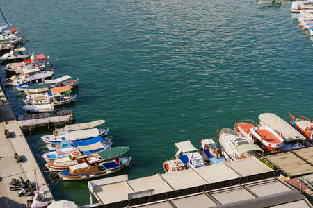 Alanya, Turkey - 24 July 2021: Sea pier port for yachts and boats in marina on a background of mountainous terrain. Sea coastのeditorial素材