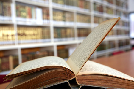 Open book in old library