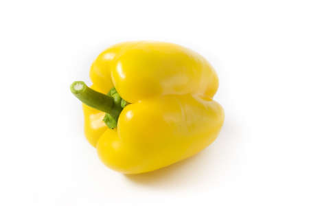 Yellow pepper on a white background. A photo close up.