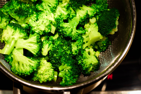 Close up portrait of cooked broccoli in a casseroleの写真素材