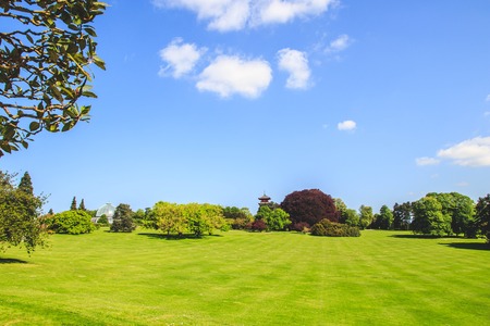 Landscape of grass field and green environment, park of the Royal Palace of Laeken in the north of Brussels.