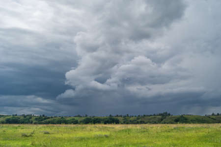 Strong storm clouds over the valley.の写真素材