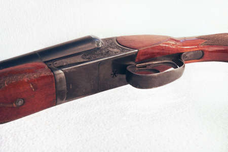 Detailed photo of a double-barrel rifle on a white backgroundの写真素材