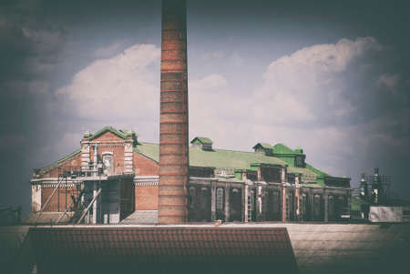 Old factory building with a pipe.の写真素材