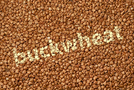 Texture of fresh clean useful buckwheat groats grain close-up. Healthy dietary food rich in microelements cellulose.の写真素材