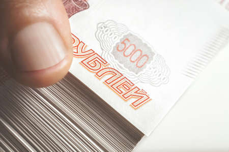 Million Russian rubles. The concept of wealth, profits, business and finance. Stack money in the five thousandth bills banknotes. A lots wads of money, many cashの写真素材
