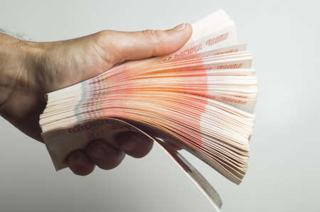 Million Russian rubles. The concept of wealth, profits, business and finance. A much money in the five thousandth bills banknotes. A lots wads of money.の写真素材