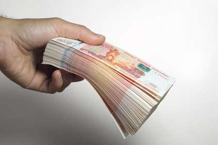 Million Russian rubles. The concept of wealth, profits, business and finance. A much money in the five thousandth bills banknotes. A lots wads of money.の写真素材