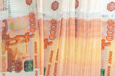 Million Russian rubles. The concept of wealth, profits, business and finance. Stack money in the five thousandth bills banknotes. A lots wads of money, many cashの写真素材