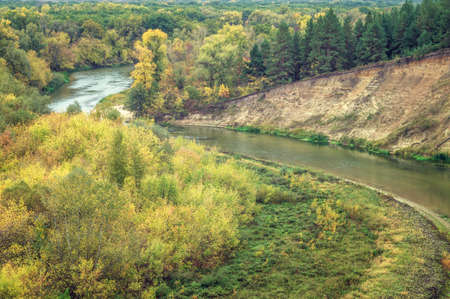 Scenic autumn winding valley Hoper river. Picturesque nature floodplain, sandy cliff edge background Aerial viewの写真素材