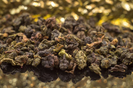 Exotic dried tea from china. Different varieties of rare black and green teas. Puerh, Tieguanyin, Da Hong Pao, Oolongの写真素材