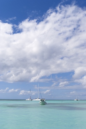 The boats in  blue caribbean lagoonの写真素材