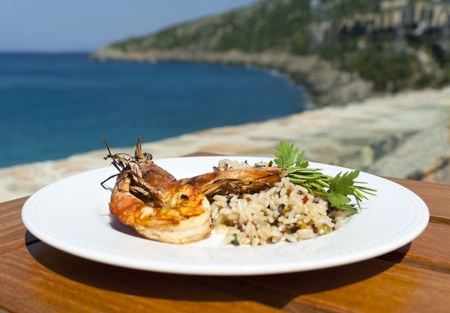 The dish with srimps and rice near mediterranean shore. Greece.の写真素材