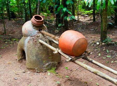 Ancient distiller for cashew fenny drink .Tropical spice plantation in Goa. Indiaのeditorial素材