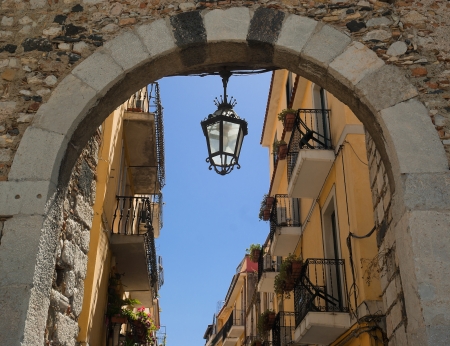 Medieval arch in Taormina,famous town in  Sicily,Italy の写真素材