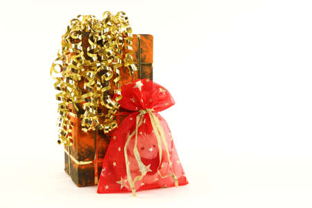 Christmas presents in orange box and red pocket