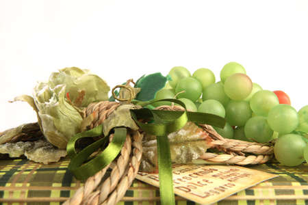 Detail of green christmas present with roses and grapevineの写真素材